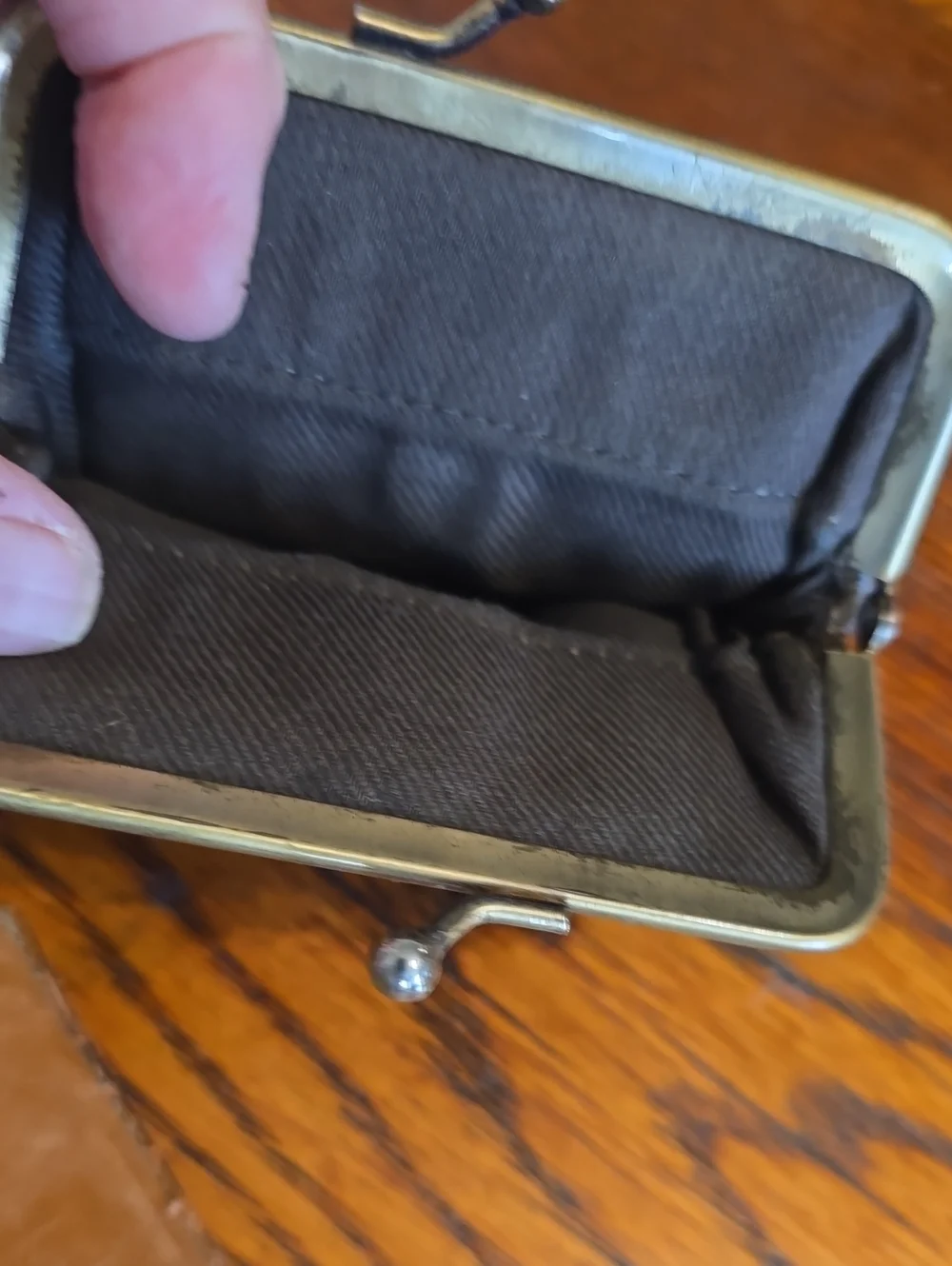 Source Unknown compact leather